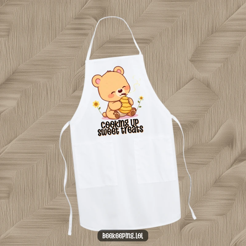 Funny Bear Cub Apron: Humorous apron with a cheerful bear cub gently smoking a small beehive, for relaxed kitchen fun.