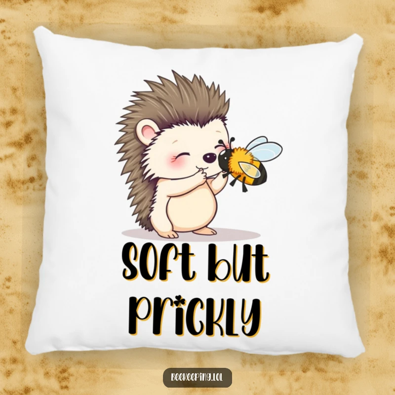 Funny pillow with a wobbly hedgehog attempting to brush a bee, offering soft comfort and a whimsical display of gentleness.