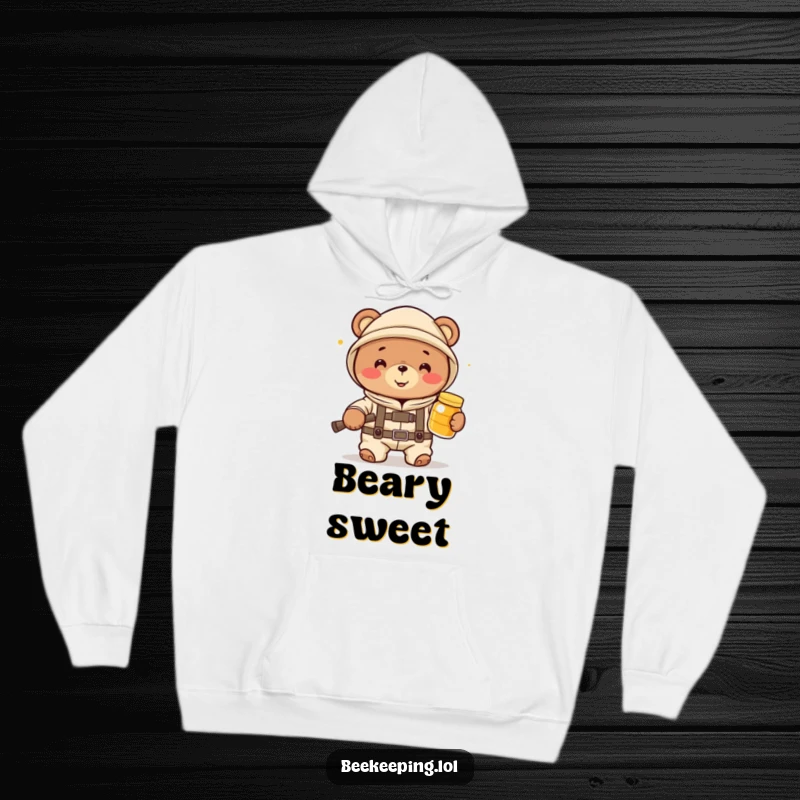 Funny bear beekeeper in a suit with a honey jar, offering a warm, humorous embrace on a cozy hoodie.