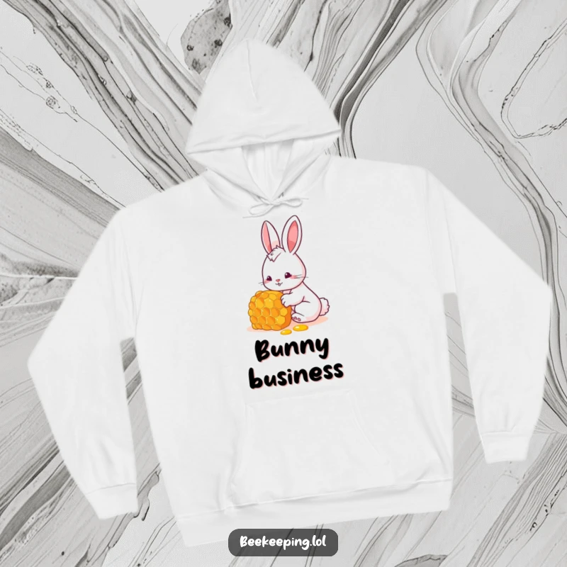 Funny bunny hoodie depicting a cute rabbit examining a honeycomb with wonder, ideal funny gift.
