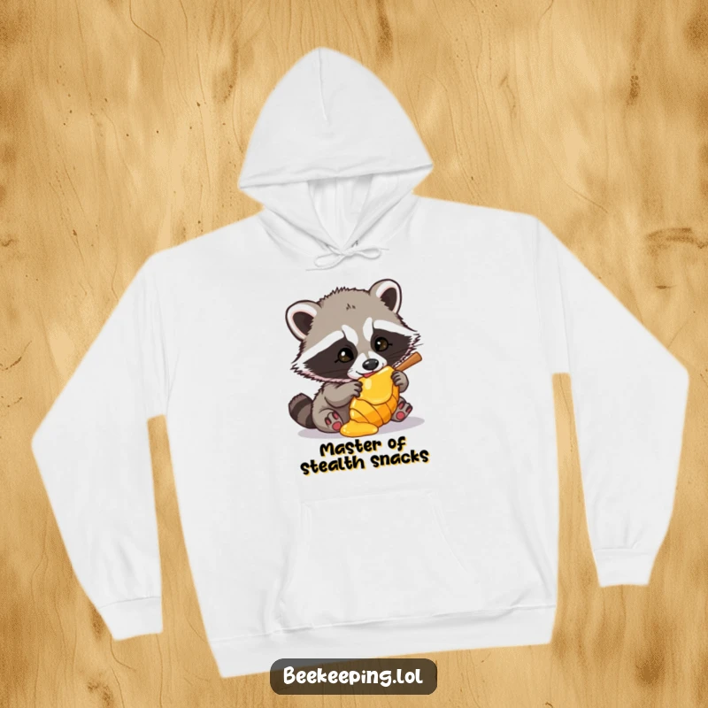 Funny Raccoon Hoodie showing a determined raccoon trying to steal honey from a beehive, capturing a moment of sweet, sticky crime.