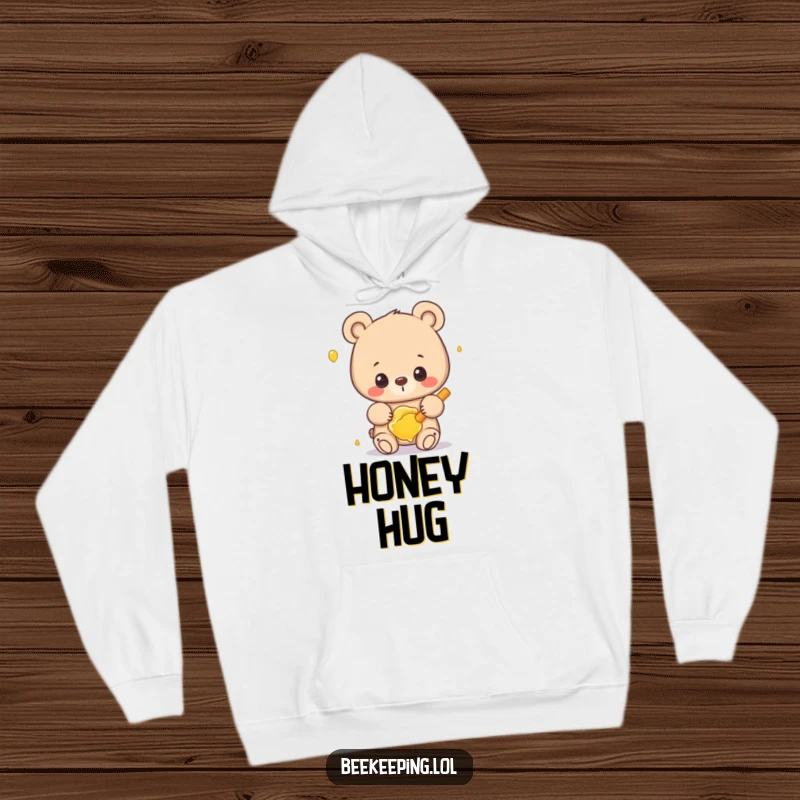 Funny bear hoodie with a proud bear gently holding a frame of honey, perfect for cozy humor.