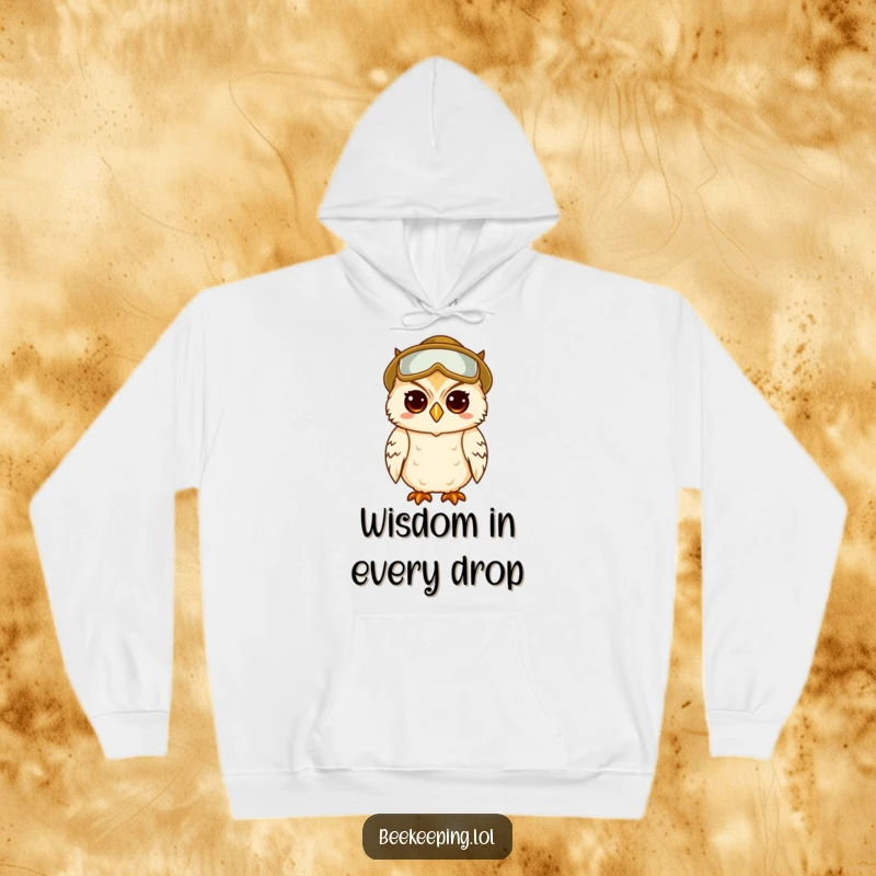 Funny hoodie displaying a wise, slightly amused owl donned in complete beekeeper attire.