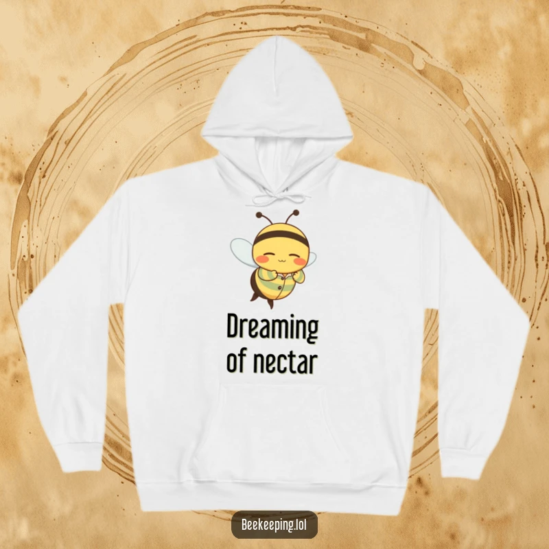 Funny hoodie with a wobbly bee character wearing striped pajamas, flying with a peaceful, sleepy grin.