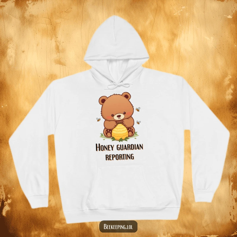 Funny Bear Hoodie: A cozy depiction of a determined bear gently overseeing a lively, buzzing beehive.