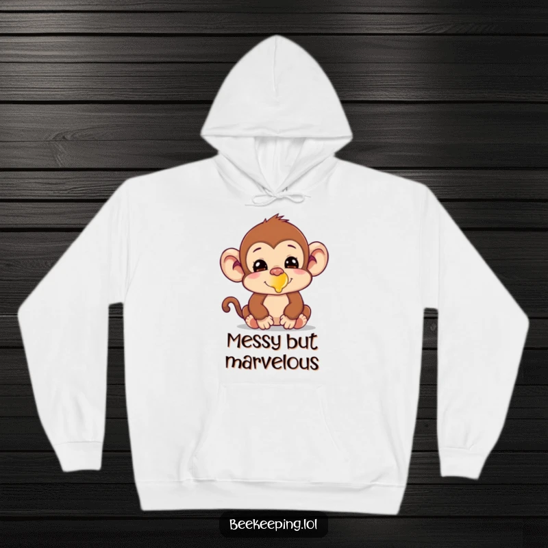 Funny silly monkey with honey on its nose on a cozy hoodie, perfect for humorous warmth.