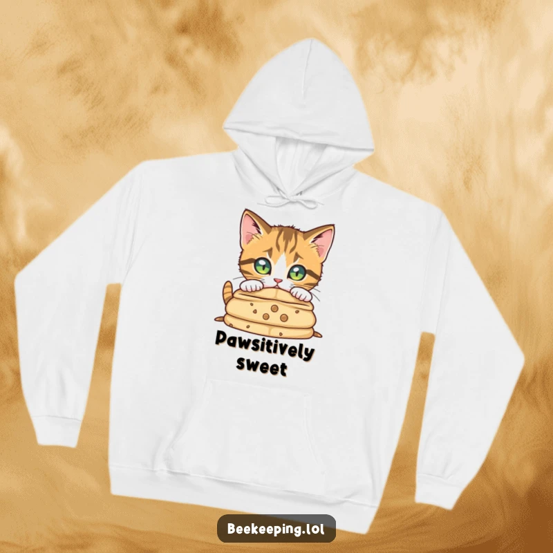 Funny curious cat peering into a beehive, radiating warmth and intrigue on a cozy hoodie.