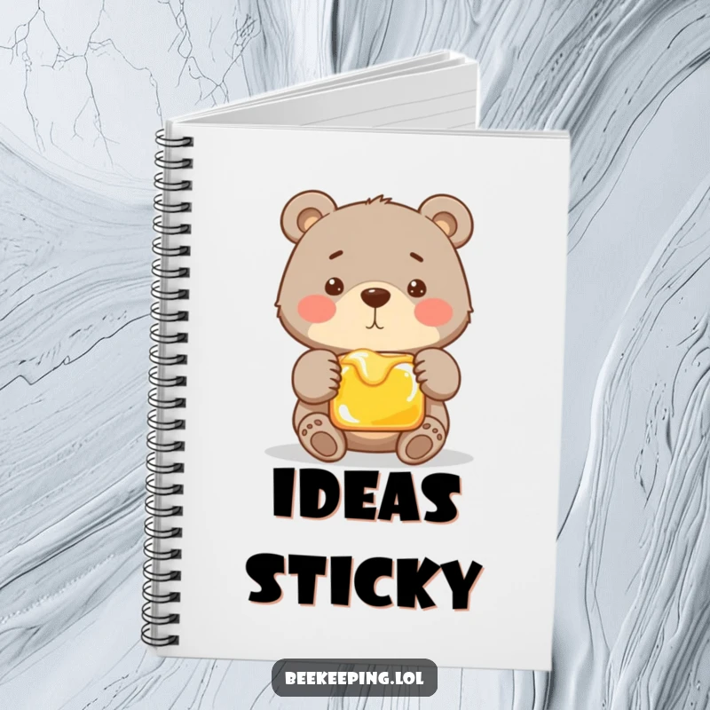 Funny notebook cover showing a proud bear gently holding a frame filled with golden honey. Ideal for notes and creative writing.