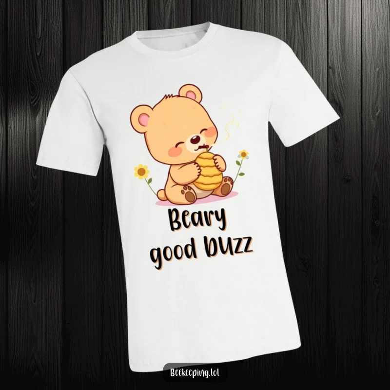 Funny Bear Cub T-Shirt: Relaxed bear cub enjoying a small beehive, showcasing a cool and humorous design.