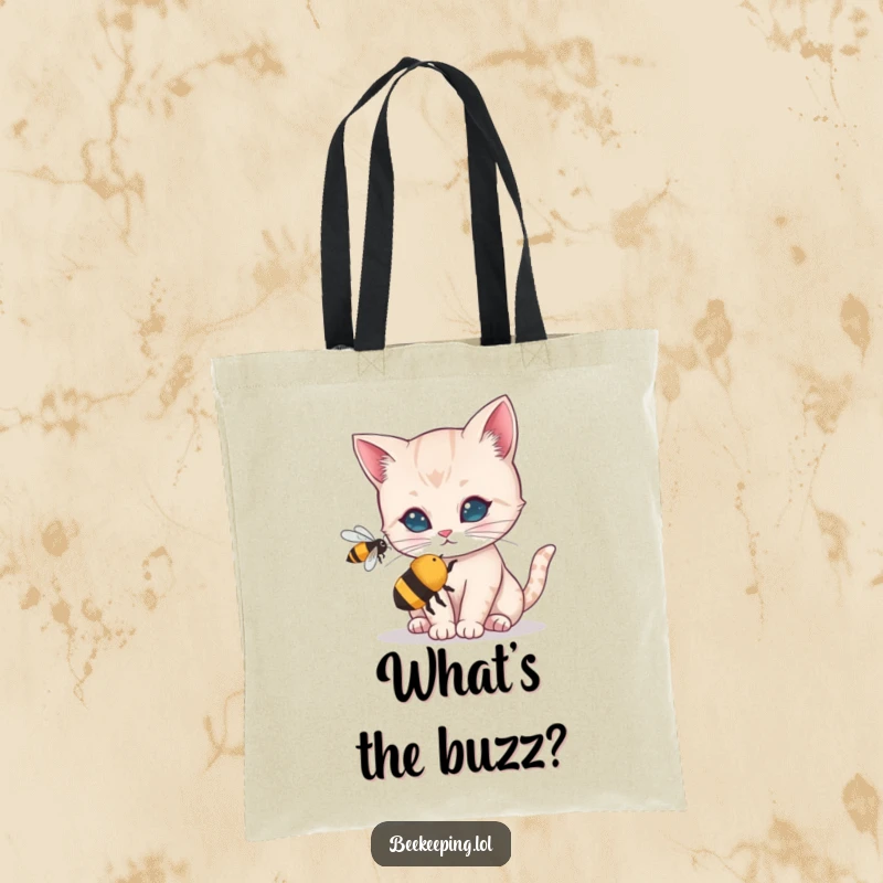 Funny tote bag depicting a curious cat cautiously inspecting a tiny buzzing bee. A charming and humorous accessory for everyday use.