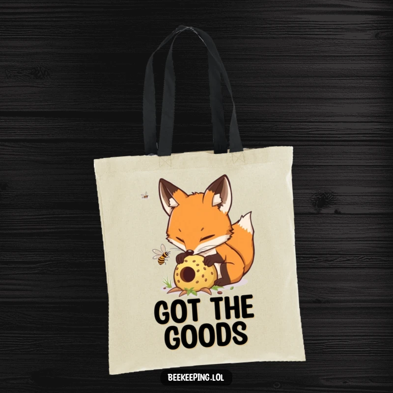 Funny determined fox carefully tending to a buzzing hive, a reusable and humorous tote bag.